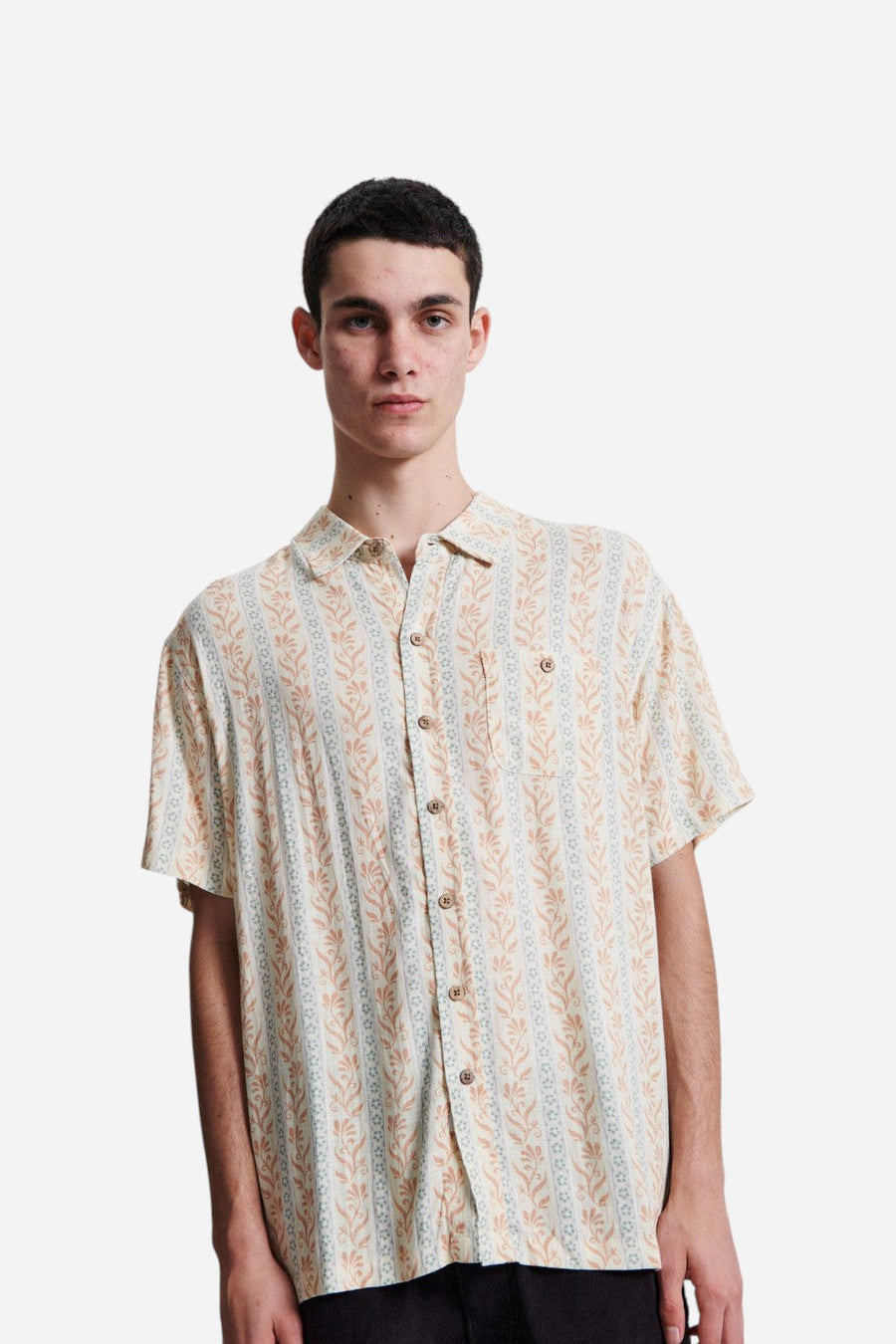 The Critical Slide Society Gravity Short Sleeve Shirt in Ecru – flat lay