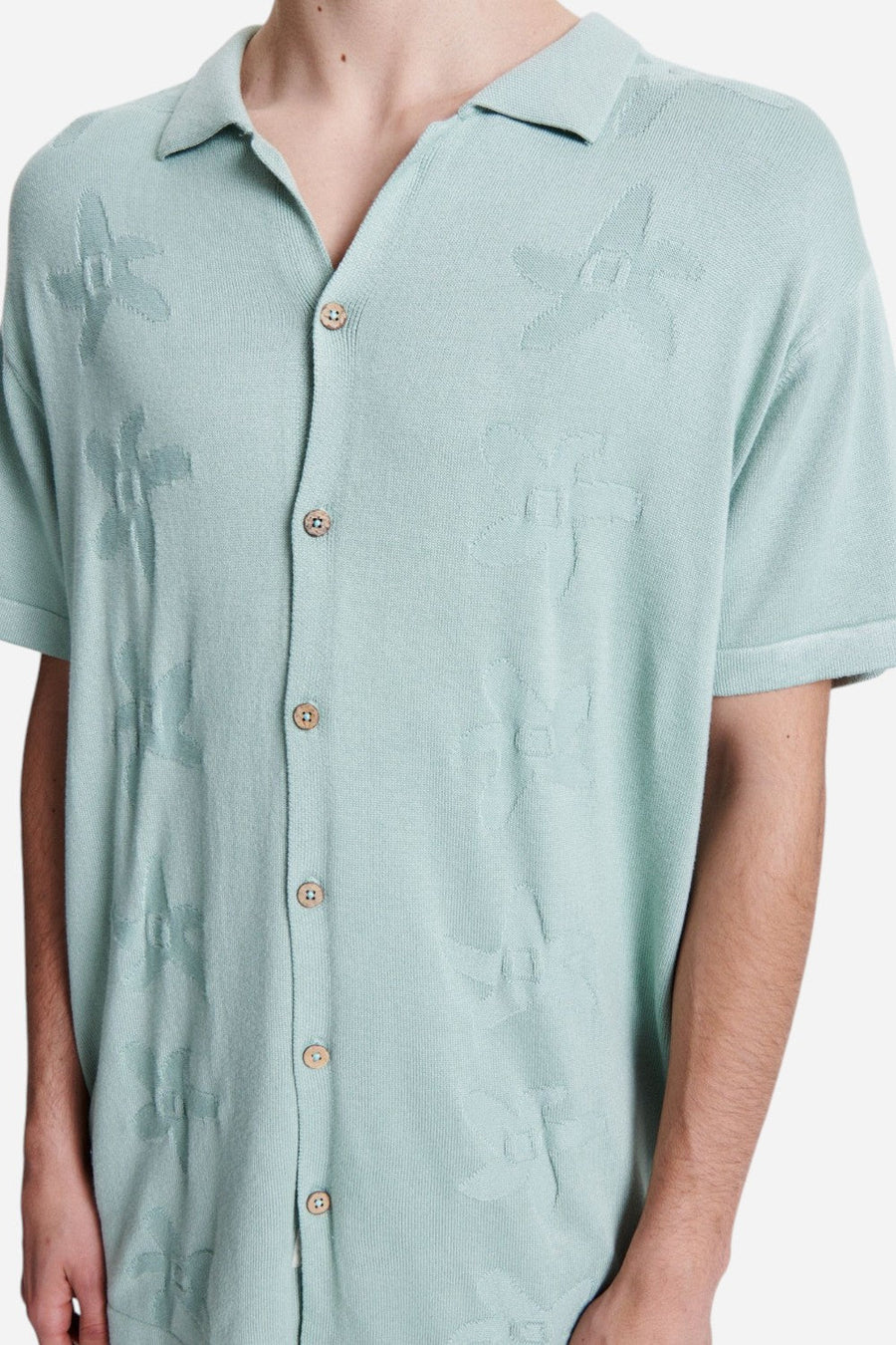 The Critical Slide Society Seeker Polo in Moss – flat lay