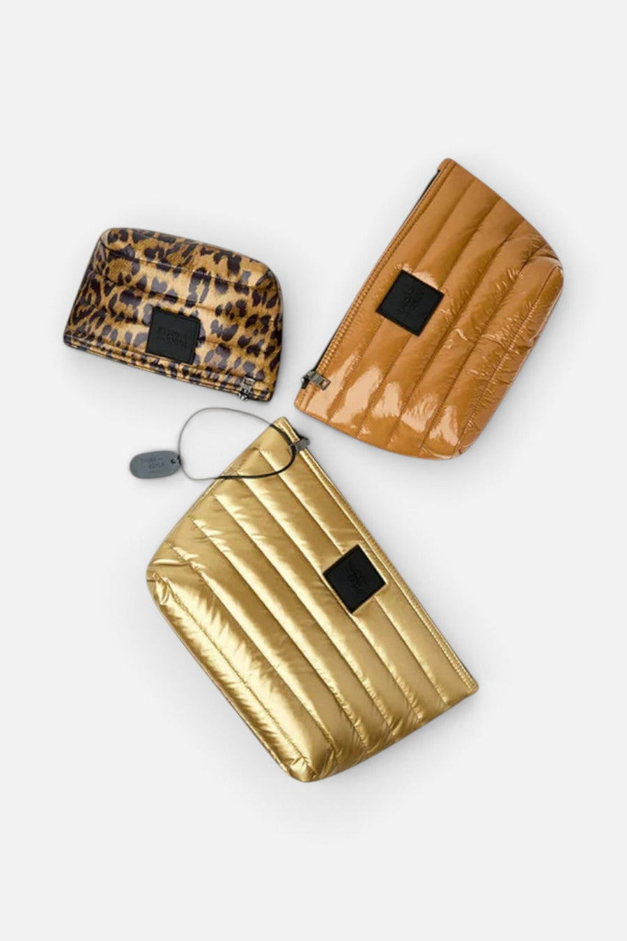 Think Royln Travel Trio Organizational Pouches in Mineral Gold Glossy Nude & Pearl Leopard – side view
