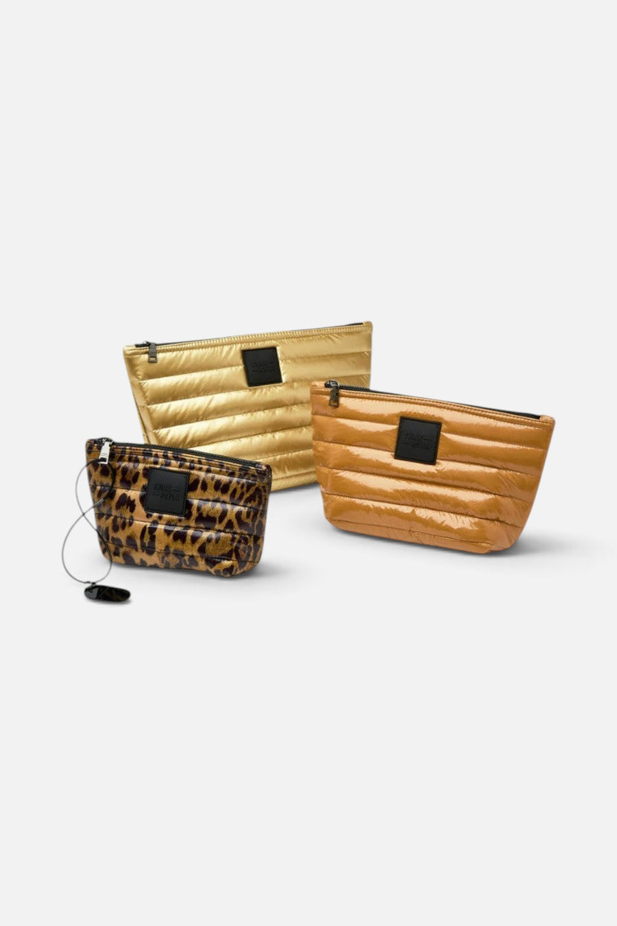Think Royln Travel Trio Organizational Pouches in Mineral Gold Glossy Nude & Pearl Leopard – side view