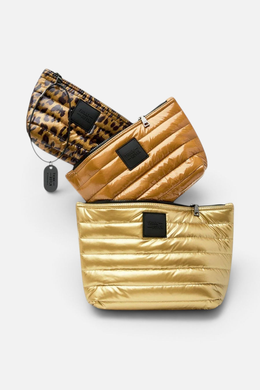Think Royln Travel Trio Organizational Pouches in Mineral Gold Glossy Nude & Pearl Leopard – side view