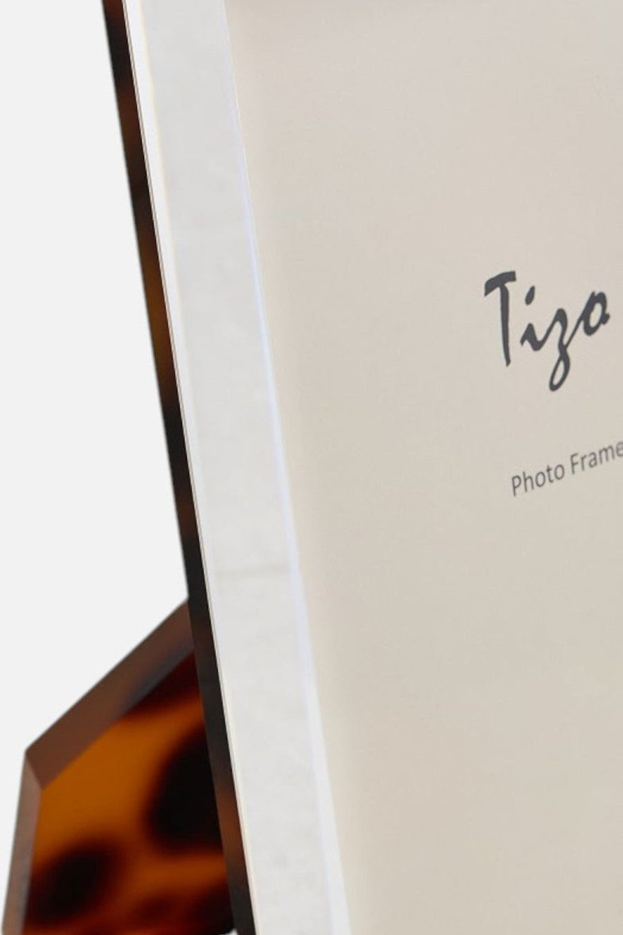 Tizo Lucite Tortoise Shell Picture Frame – flat lay