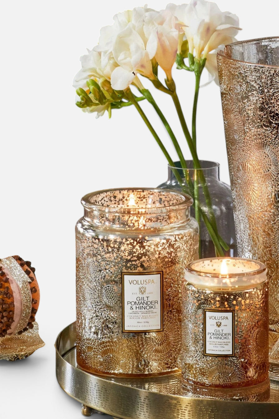 Voluspa Gilt Pomander & Hinoki Small Embossed Glass Candle – side view