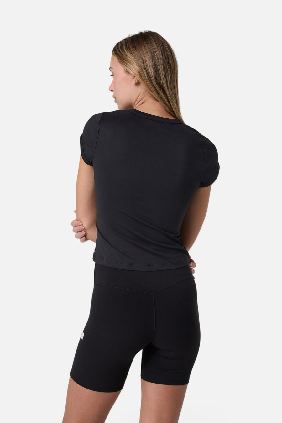 Vuori Halo Baby Tee in Solid Black – back view